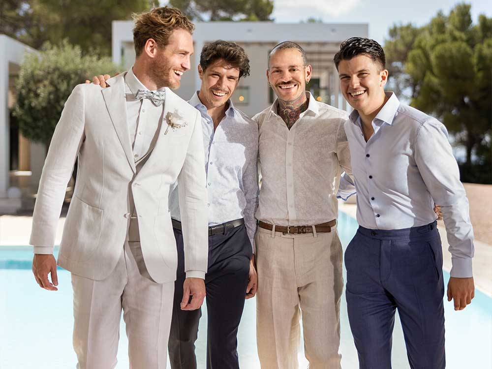 herrenmode-herrenanzuege-baukasten-hochzeitsanzug-anlassmode-modehausheinze Bilder von einer Gruppe mit Männern in einem schicken Outfit